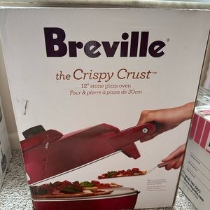 Breville the Crispy Crust Pizza Maker in Red.